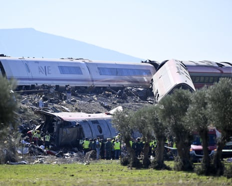 Rescue workers at the site of Wednesday’s rail disaster in Spain’s Toledo province. A high-speed service hit another train halted by a signalling fault