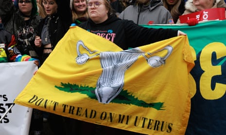 flag says 'dont tread on my uterus'