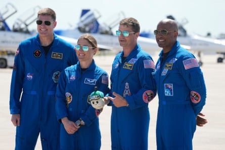 Artemis 2 crew members (from left) Jeremy Hansen, Christina Koch, Reid Wiseman, and Victor Glover pose for a photo after the crew’s arrival at the Kennedy Space Center in Cape Canaveral, Florida, on 27 March.