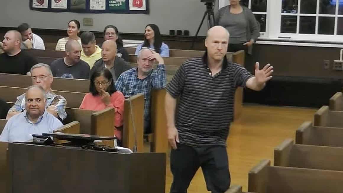 Will Thilly breakdances at a meeting