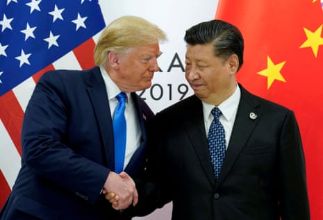 US president Donald Trump shakes hands with Chinese leader Xi Jinping.