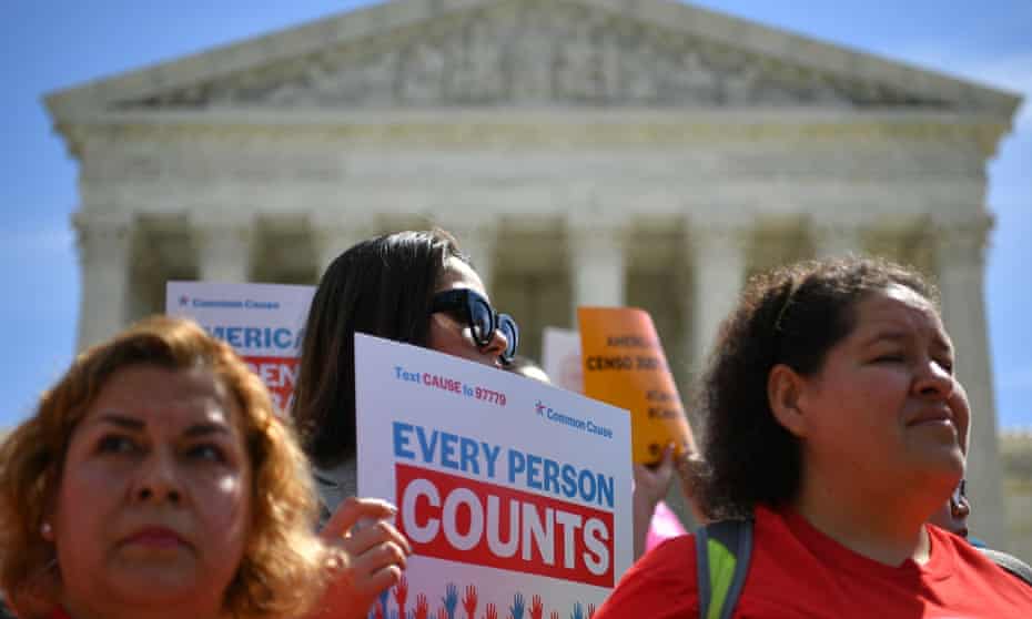 Demonstrators rally at the US supreme court in Washington DC, to protest a proposal to add a citizenship question in the 2020 census.