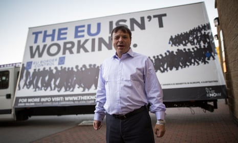 Aaron Banks in front of an anti-EU advert in 2015