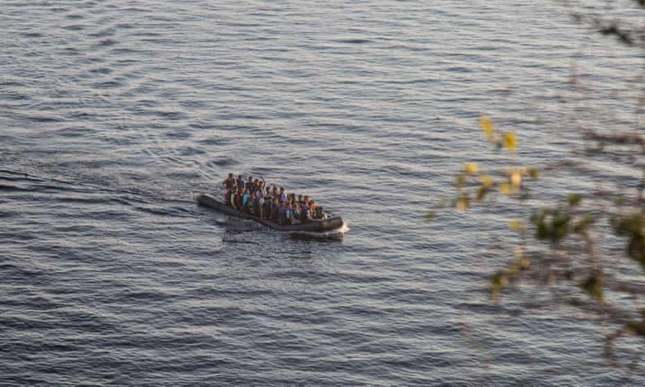 A rubber dinghy carrying approximately 45 people mostly from Afghanistan crossing the strait between Greece and Turkey, in Molyvos
