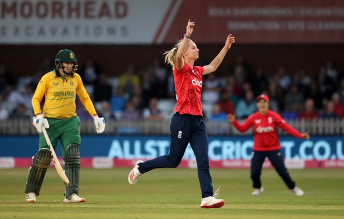 England debutant Freya Kemp celebrates taking the wicket of South Africa’s Anneke Bosch, her first T20I wicket.