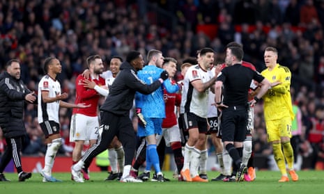 Mitrovic protesting after receiving a red card.