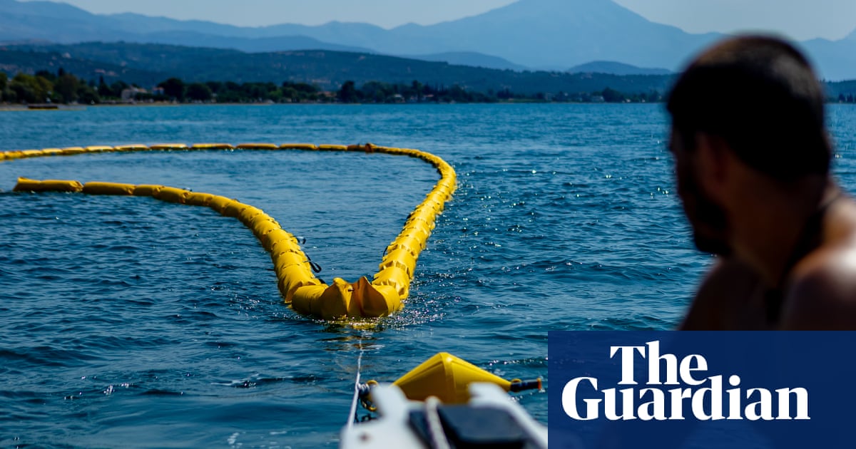 ‘Better safe than sorry’: Greece installs floating barrier to ward off toxic fish