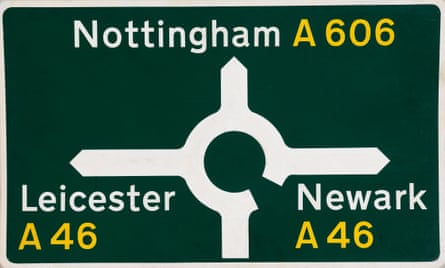 A hand-lettered 1950s road sign using the Transport typeface designed by Calvert and Jock Kinneir.