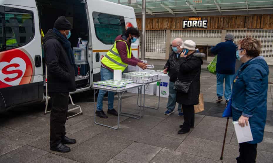Free Covid-19 lateral flow test kits are given out to the public in Slough, Berkshire.