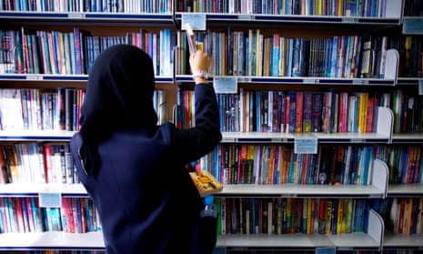 A student browses in her school library.