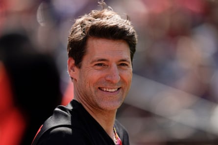A man smiles