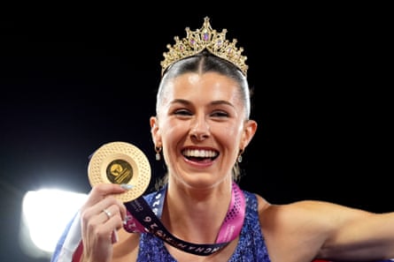 Amy Hunt with her gold medal after the 200m