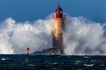 A huge wave hits the lighthouse of the town of Andratx, Majorca island, Balearic islands, eastern Spain.
