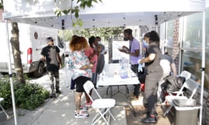 Covid live news: UK reports 31,772 daily infections and 26 new deaths; new restrictions in Libya after record cases | World news 6 A pop-up vaccination site in Brooklyn, New York earlier this week.