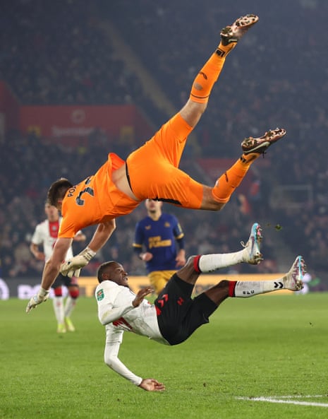 Moussa Djenepo feels the full force of Nick Pope.