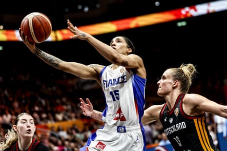 Gabby Williams drives against Germany.