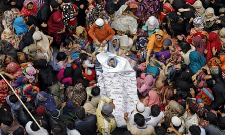 Fellow Muslims mourn Muddasir Khan, who died in the Delhi riots.