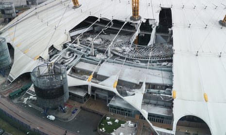 The white-domed roof of the O2 arena is seen damaged by the wind. Photo: REUTERS/May James