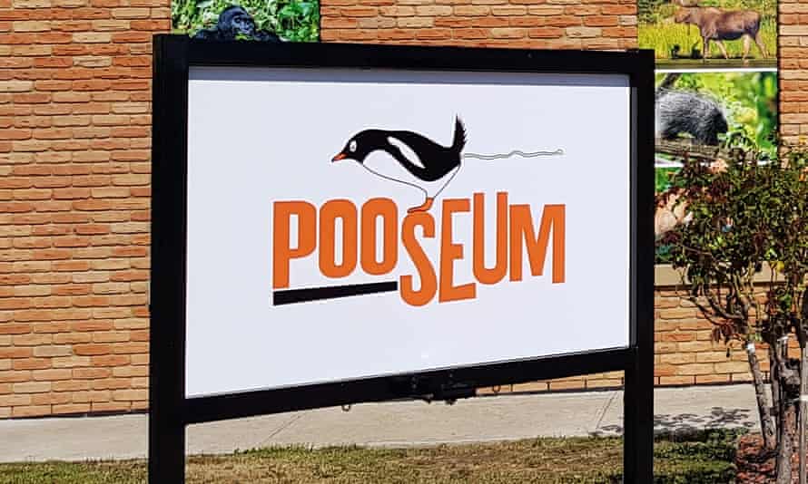 The Pooseum sign