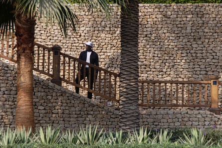 Dwight Yorke on steps in Dubai