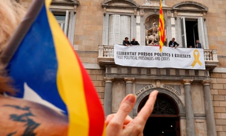 Catalan separatist banner hangs from the balcony of the Generalitat Palace in Barcelona.
