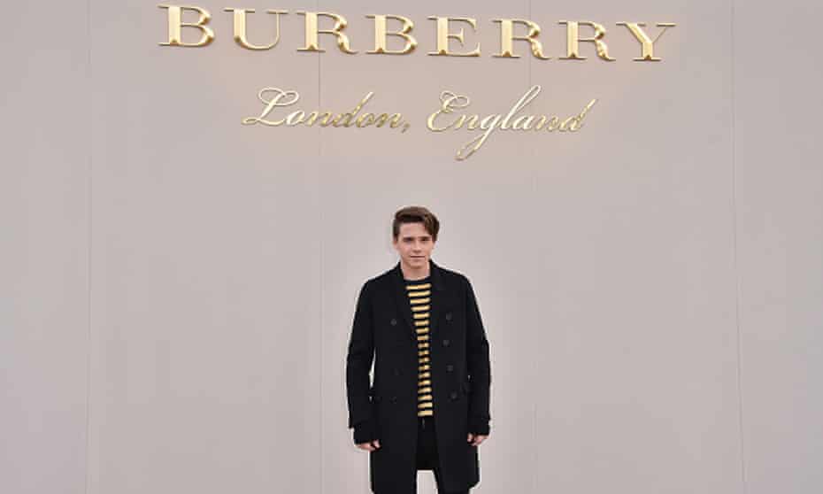 Brooklyn Beckham wearing Burberry attends the Burberry Menswear January 2016 Show.
