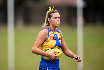 Georgie Cleaver holds the football during a match