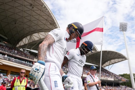 Ben Stokes and Jofra Archer walk out to bat on day three.