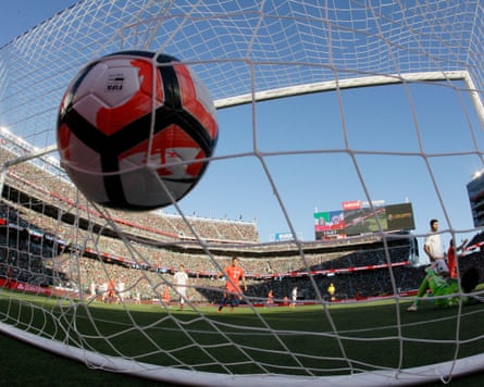 A view of a soccer ball going into a net during a match at Levi’s Stadium.