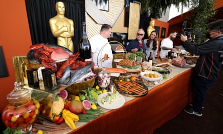 Puck and his team display food during a preview of the food, beverages and decor of this year’s Governors Ball, the Academy’s official post-Oscars celebration.