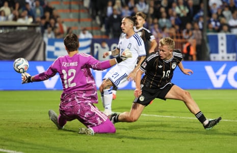 Germany's Jonathan Burkardt scores a goal that was later disallowed.