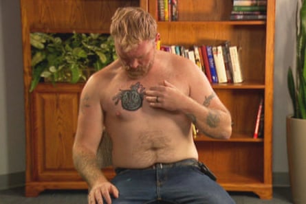 a man with a tattoo