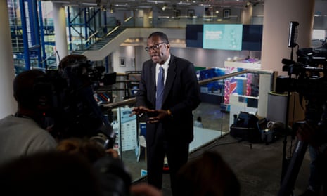Chancellor of the Exchequer Kwasi Kwarteng gives an interview as he attends the second day of the annual Conservative Party conference.