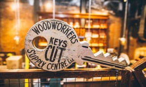 A giant wooden key on the bar at The Woodworkers, Belfast.