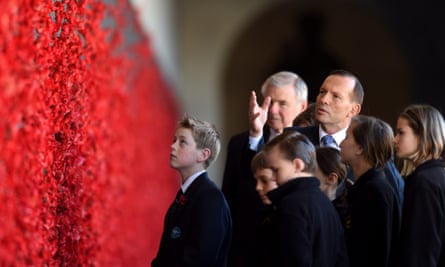 ‘The obvious place to start is to ensure that every Australian child gets a great education.’ Tony Abbott, the prime minister, with schoolchildren at the Australian War Memorial.