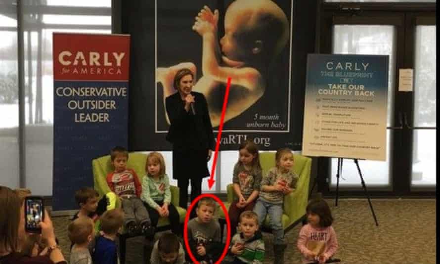 Carly Fiorina talks abortion surrounded by children including four-year-old Chatham Beck, circled.