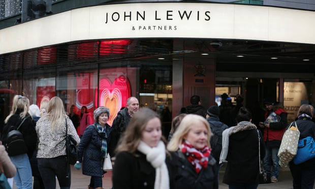 Shoppers walk past John Lewis on Oxford Street