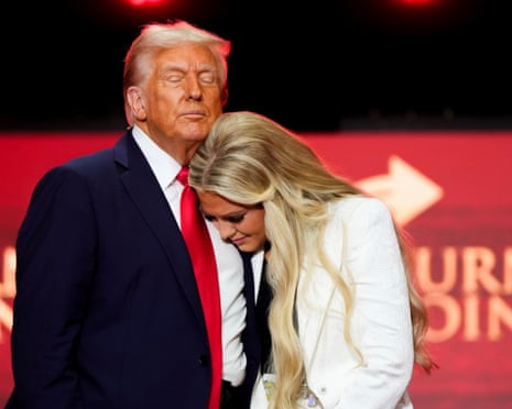 Donald Trump hugs Erika Kirk at the conclusion of a memorial for her husband, conservative activist Charlie Kirk, 21 September 2025, in Glendale, Arizona.