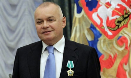 Russian journalist Dmitry Kiselyov posing for a photo in 2011.
