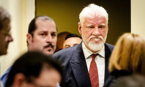 Slobodan Praljak, a Bosnian Croat general, enters court in The Hague on Wednesday.