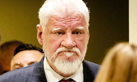 Judgement in the International Criminal Tribunal for the former Yugoslavia<br>epaselect epa06357211 Bosnian Croat, Slobodan Praljak (R) enters the court in The Hague, The Netherlands, 29 November 2017, prior to the appeals judgement in the International Criminal Tribunal for the former Yugoslavia (ICTY), for war crimes committed during the bloody break-up of Yugoslavia.  EPA/ROBIN VAN LONKHUIJSEN / POOL