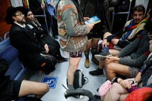 Passengers wear no trousers as they ride the Jerusalem’s light train in Jerusalem, Israel