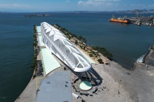 An aerial view of the Museum of Tomorrow, with the sea in the background