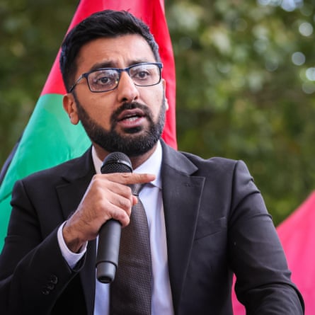 Adnan Hussain speaks at a pro-Palestine rally at Downing Street.