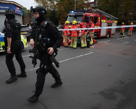 Police and first responders at the scene in Crumpsall, Manchester.