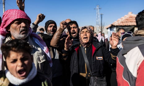 People protest on the north-eastern outskirts of Damascus on Christmas Day – an example of some of the unrest since the fall of Bashar al-Assad.