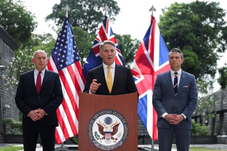 Richard Marles speaks as British defence secretary John Healey (left) and US secretary of defence Pete Hegseth look on
