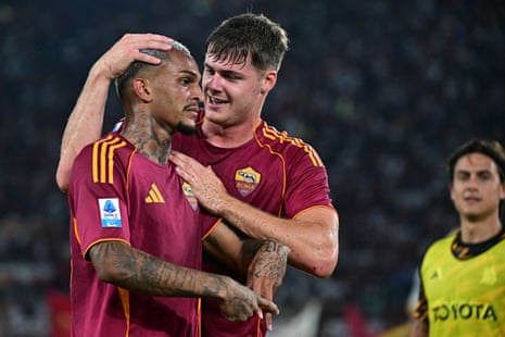 Wesley celebrates with Roma teammate Evan Ferguson