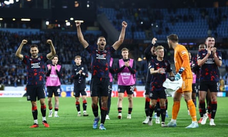 Rangers players share the joy of victory with their fans at the Eleda Stadion.