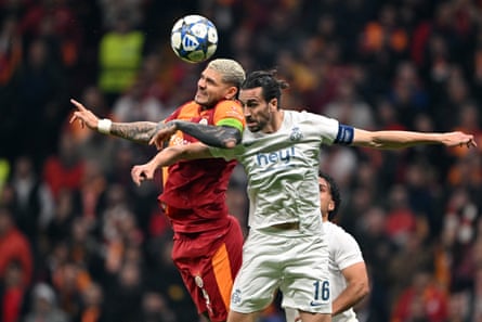 Christian Burgess vying with Galatasaray’s Mauro Icardi in this season’s Champions League.